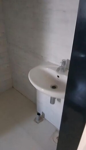 Bathroom in 3 BHK Apartment at Navghar Road – for Rent