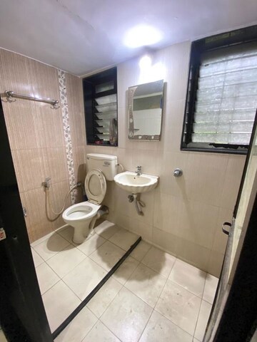 Bathroom in 2 BHK Apartment at Kalpataru Immensa, Kolshet Road – for Rent