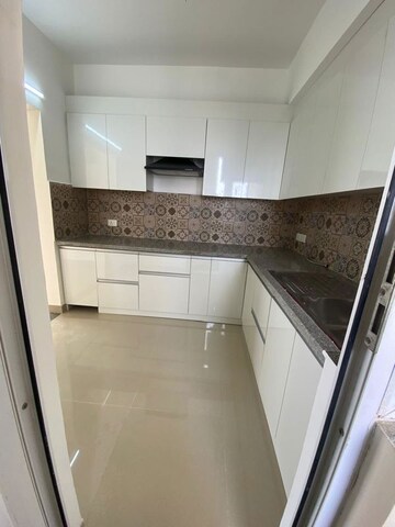 Kitchen in 3 BHK Apartment at Ramprastha Primera, Sector 37d – for Rent