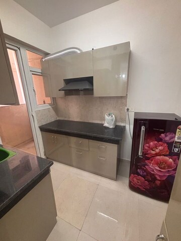 Kitchen in 2 BHK Apartment at Signature The Millennia 2, Sector 37d – for Rent