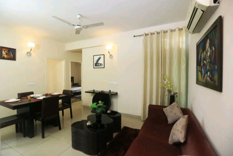Living Room, wave-executive-floors 3 Bedroom 800 Sq.Ft. Apartment In Wave City Ghaziabad 9969654