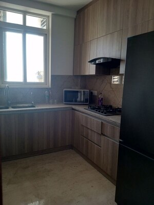 Kitchen in 3 BHK Apartment at Ambience Creacions, Sector 22 – for Rent