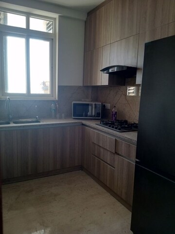 Kitchen in 3 BHK Apartment at Ambience Creacions, Sector 22 – for Rent