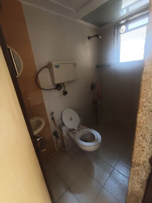 Bathroom in 1 BHK Apartment at Agarwal Trinity Towers, Malad West – for Rent