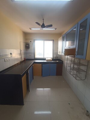 Kitchen in 1 BHK Apartment at Agarwal Trinity Towers, Malad West – for Rent