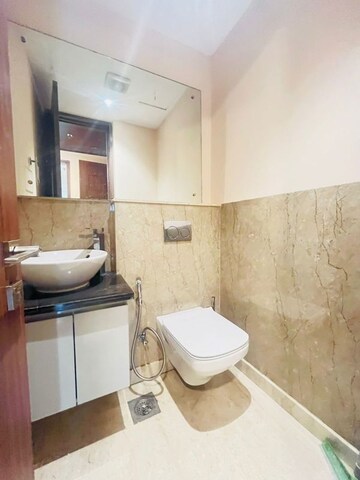 Bathroom in 3 BHK Apartment at Ambience Tiverton, Sector 50 – for Rent