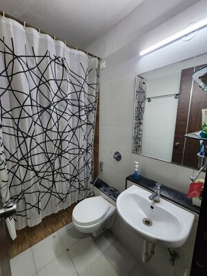 Bathroom in 2 BHK Apartment at Ganga Arcadia, Kharadi – for Rent