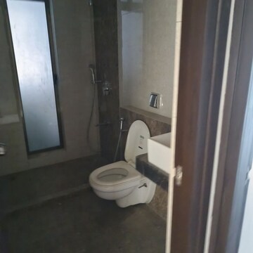 Bathroom in 4 BHK Apartment at Raj Infinia, Malad West – for Rent