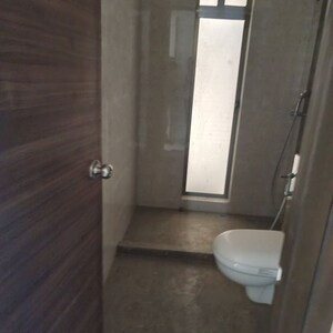 Bathroom in 4 BHK Apartment at Raj Infinia, Malad West – for Rent