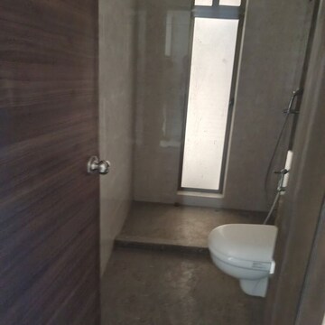 Bathroom in 4 BHK Apartment at Raj Infinia, Malad West – for Rent