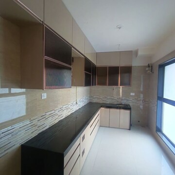 Kitchen in 4 BHK Apartment at Raj Infinia, Malad West – for Rent