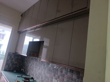 Kitchen in 3 BHK Apartment at Amrapali Heartbeat City, Sector 107 – for Rent