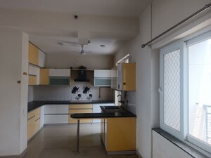 Kitchen in 3.5 BHK Apartment at Amrapali Heartbeat City, Sector 107 – for Rent