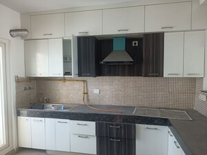 Kitchen in 2 BHK Apartment at Amrapali Heartbeat City, Sector 107 – for Rent