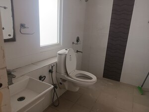 Bathroom in 2 BHK Apartment at Amrapali Heartbeat City, Sector 107 – for Rent