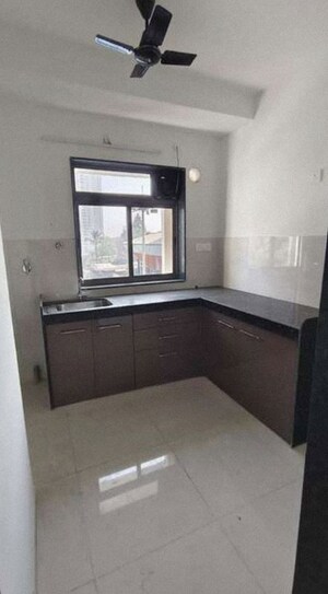 Kitchen in 1 BHK Apartment at Runwal Eirene, Balkum Pada – for Sale