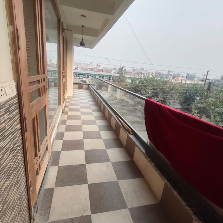 Balcony, sector 63a 2.5 Bedroom 1200 Sq.Ft. Builder Floor In Sector 63a Noida 9969951