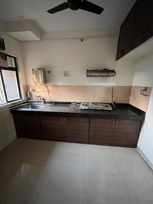 Kitchen in 1 BHK Apartment at Highland Residency CHSL, Balkum Pada – for Sale