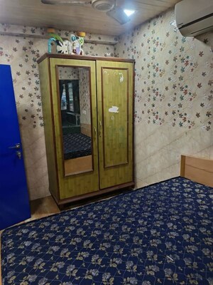 Bedroom in 1 BHK Apartment at Sukh Sagar CHS, Seawoods – for Rent