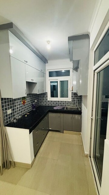 Kitchen in 2 BHK Apartment at Nilaya Greens, Raj Nagar Extension – for Sale