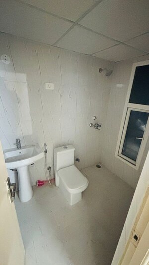 Bathroom in 2 BHK Apartment at Nilaya Greens, Raj Nagar Extension – for Sale