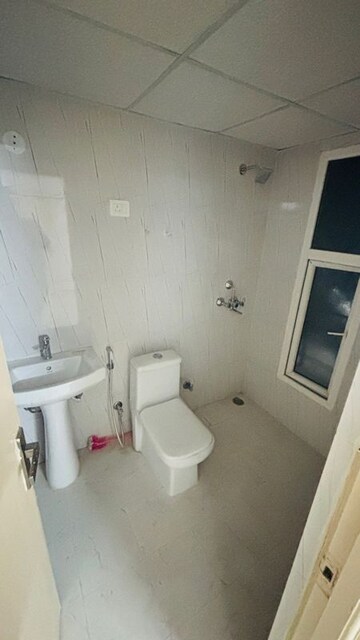 Bathroom in 2 BHK Apartment at Nilaya Greens, Raj Nagar Extension – for Sale