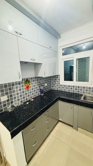 Kitchen in 2 BHK Apartment at Nilaya Greens, Raj Nagar Extension – for Sale