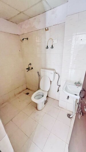 Bathroom in 2 BHK Apartment at Emenox Brave Hearts Plaza, Raj Nagar Extension – for Sale