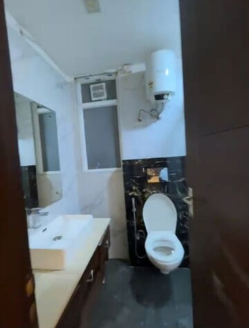 Bathroom in 3 BHK Apartment at Sushant Lok I – for Rent