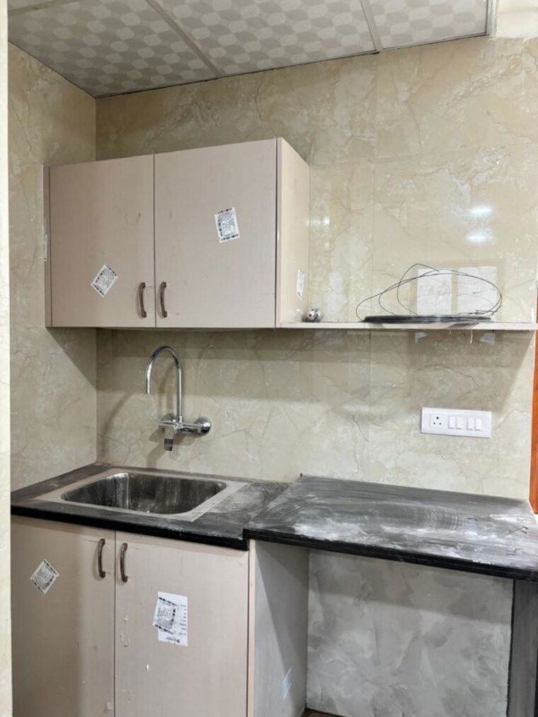 Kitchen, unitech-uniworld-gardens 3 Bedroom 2027 Sq.Ft. Apartment In Sector 47 Gurgaon 9963400