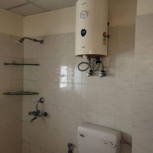 Bathroom in 2 BHK Apartment at Emenox Brave Hearts, Raj Nagar Extension – for Rent