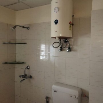 Bathroom in 2 BHK Apartment at Emenox Brave Hearts, Raj Nagar Extension – for Rent