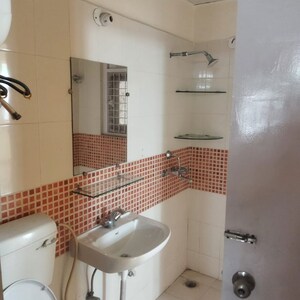 Bathroom in 2 BHK Apartment at Emenox Brave Hearts, Raj Nagar Extension – for Rent