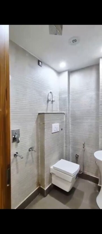 Bathroom in 3 BHK Builder Floor at Dwarka Mor – for Sale