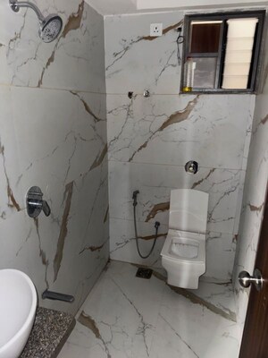 Bathroom in 3 BHK Apartment at Avikam Giriraj, Zundal – for Rent
