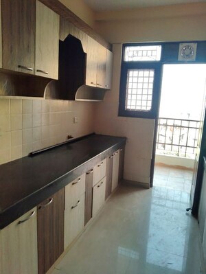 Kitchen in 3 BHK Apartment at Raj Nagar Extension – for Sale