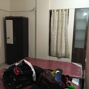 Bedroom in 2 BHK Apartment at Camelot Society, Pune International Airport – for Sale