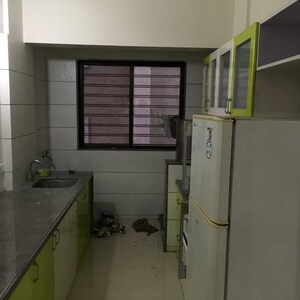 Kitchen in 2 BHK Apartment at Camelot Society, Pune International Airport – for Sale