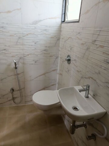 Bathroom in 2 BHK Apartment at Nyati Enclave, Mohammadwadi – for Rent