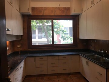 Kitchen in 4 BHK Apartment at Vasant Vihar – for Rent