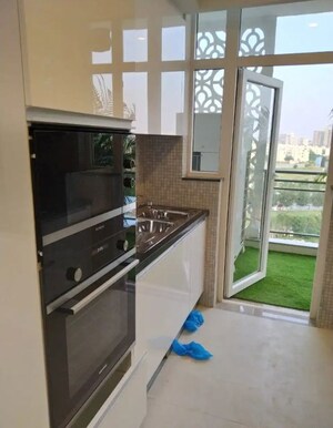 Kitchen in 4 BHK Apartment at DLF The Ultima, Sector 81 – for Sale