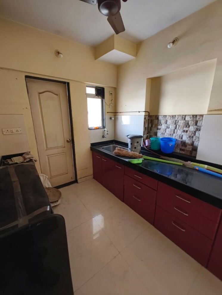 Kitchen, cosmos-orchid 1 Bedroom 400 Sq.Ft. Apartment In Ghodbunder Road Thane 9970572