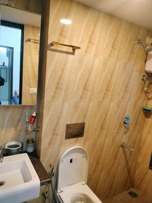 Bathroom in 2 BHK Apartment at Lodha Quality Home Tower 5, Majiwada – for Rent