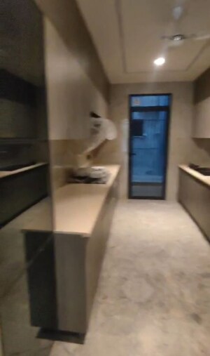 Kitchen in 4 BHK Apartment at Dlf Phase I – for Rent