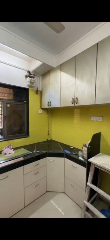Kitchen in 2 BHK Apartment at Ahimsa Niketan CHS, Malad West – for Rent