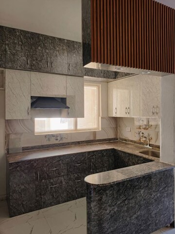 Kitchen in 2 BHK Apartment at Pivotal Riddhi Siddhi, Sector 99 – for Rent