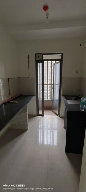 Kitchen in 1 BHK Apartment at Kalpataru Immensa, Kolshet Road – for Sale