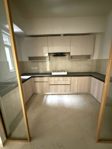 Kitchen in 3 BHK Apartment at Smart World Orchard, Sector 61 – for Rent