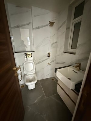 Bathroom in 3 BHK Apartment at Smart World Orchard, Sector 61 – for Rent