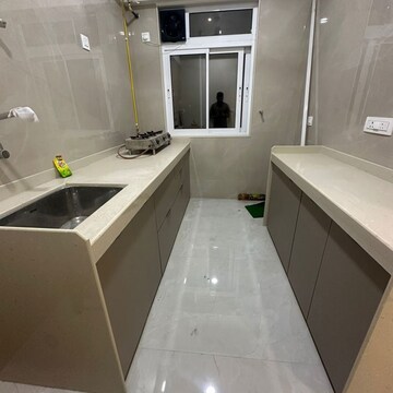 Kitchen in 3 BHK Apartment at Shraddha Elite, Poisar – for Rent